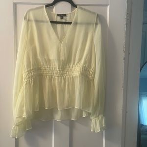 Size large. Express brand long sleeve yellow sheer dress top.